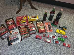 lot 119 image: Collection of Coca-Cola Themed Matchbox Cars and Memorabilia