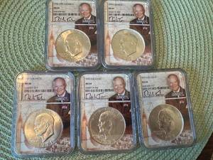 lot 246 image: Set of 5 NGC Graded MS 66 Silver Eisenhower Dollars (1971-1976)