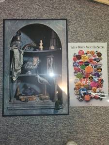 lot 306 image: Set of 2 Decorative Posters 60s Themed Buttons and Vintage Shelf Still Life