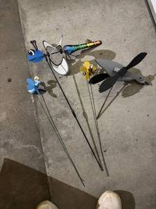 lot 335 image: Assortment of Wind Spinner Garden Stakes