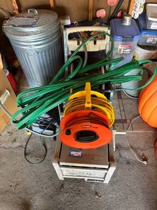 lot 350 image: Garden Hose Reel Cart with Multiple Hoses and Accessories