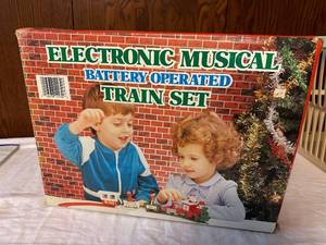 lot 379 image: Electronic Musical Battery Operated Train Set with Christmas Melodies