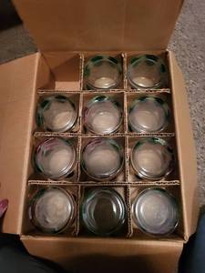 lot 421 image: Set of 12 Santa Themed Drinking Glasses and 3 Christmas Caroler Candles