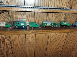 lot 496 image: Collection of 6 Vintage Railway and Delivery Toy Trucks with Protective Cases