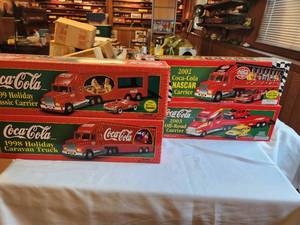 lot 142 image: Collection of Coca-Cola Holiday Edition Die-Cast Trucks and NASCAR Carrier