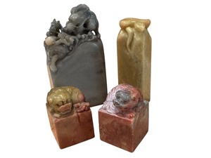 lot 54 image: Collection of 4 Asian Stone Chops with Intricate Designs