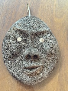 lot 26 image: Handcrafted Wale Bone Mask with Unique Facial Carving