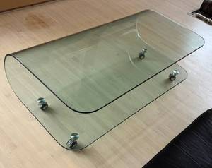 lot 22 image: LR - Pavoncello Whereisit Collection Bugatti Coffee Table
