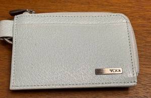 lot 109 image: K - Tumi Light Blue Leather Key Ring and Card Holder Wallet