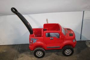 lot 47 image: Red Little Tikes Raptor Ride-On Toy Truck with Steering Handle