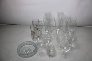 lot 123 image: Collection of Various Glassware Including Beer Mugs, Wine Goblets, and Serving Dish