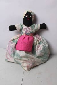 lot 152 image: Handcrafted Jamaican Fabric Doll with Embroidered Apron