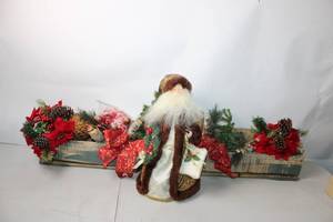 lot 167 image: Festive Holiday Centerpiece with Santa Figurine and Decor