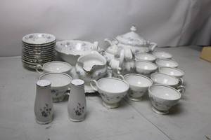 lot 200 image: Vintage 53-Piece Blue Floral China Tea Set