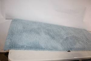 lot 271 image: Light Blue Shag Area Rug, 64x25 Inches