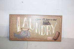 lot 288 image: Vintage Laundry Sign with Rustic Design