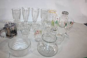 lot 295 image: Assorted Glassware Collection Featuring Vases, Cups, and Jars