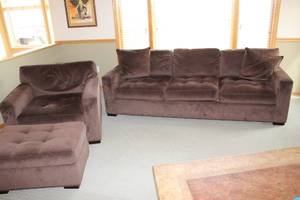 lot 56 image: 3-Piece Brown Upholstered Sofa Set with Ottoman