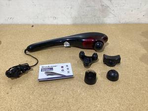 lot 622 image: Brookstone Handheld Percussion Body Massager, 4 Vibration Modes, 5 Interchangeable Heads, Black