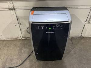 lot 311 image: Honeywell MN4HFS9 14000 BTU 500-700 Sq. Ft. Portable Air Conditioner with Heating, Cooling, Dehumidifier & Fan