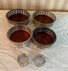 lot 137 image: Fancy Silver Plate Wine Coaster Set - (4)