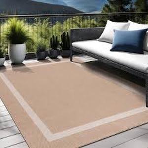 lot 32 image: Beige White 8 x 10 Border IndoorOutdoor Area Rug