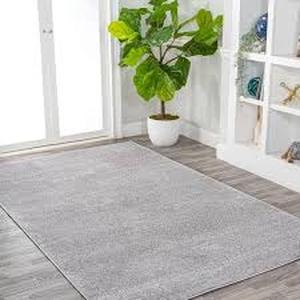 lot 55 image: Haze Solid Low-Pile Light Gray 10 ft. x 14 ft. Area Rug