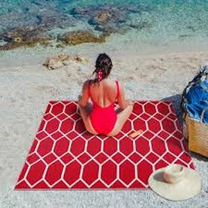 lot 63 image: Miami Red White 8 ft. x 10 ft. Reversible Recycled Plastic IndoorOutdoor Area Rug
