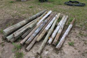 lot 22 image: Lot of Wood Fence Posts