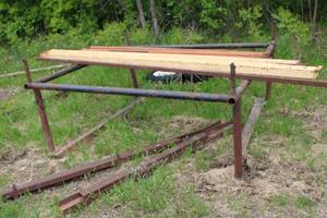 lot 26 image: Collection of Steel Beams, Metal Scraps, and a Large Propane Tank