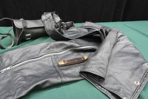lot 53 image: LEATHER CHAPS  KNIFE  LEATHER POUCH