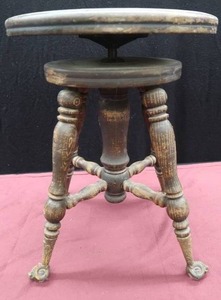 lot 124 image: ANTIQUE   VINTAGE GLASS BALL CLAW FOOT STOOL
