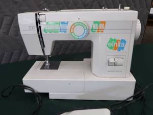 lot 138 image: ELNITA SEWING MACHINE