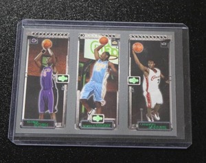 lot 105 image: 2003-04 Topps Rookie Matrix LeBron James - Carmelo Anthony - Chris Bosh Rookie Card