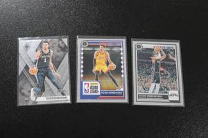 lot 169 image: 2023-24 Victor Wembanyama Rookie Card Lot  3 Rookie Cards