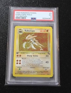 lot 234 image: 1999 Pokemon Fossil 1st Edition Kabutops Holo #962 PSA 5