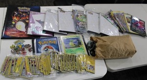 lot 255 image: Large Pokemon Card & Accessories Lot  Promo Cards - Binders - Coins -Pins - Jumbo Cards