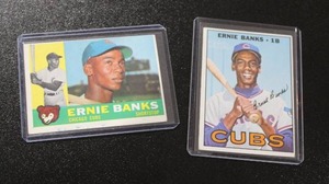 lot 303 image: 1960 & 1967 Topps Ernie Banks Lot  Mid Grade w No Creases (1960 is miscut)