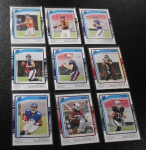 lot 312 image: 2024 Donruss Rated Rookie Football Star Rookie Card Lot  9 Rookie Cards