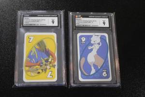 lot 347 image: 2019 Pokemon Playing Cards Pocket Uno Mewtwo & Zacian CGC 9  2 Cards