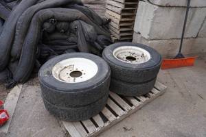 lot 7 image: 4 - Bobcat Skid Loader Skid Steer Bridgestone Snow Plowing Tires On 8 Bolt Rims