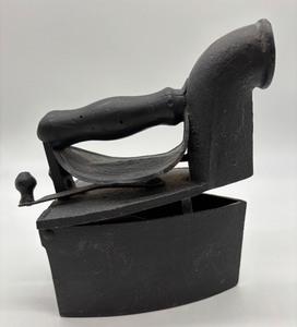 lot 42 image: Antique Cast Iron Charcoal Clothes Iron with Wooden Handle