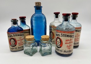 lot 62 image: Collection of Vintage Mrs. Stewarts Liquid Bluing Bottles and Corked Glass Jars