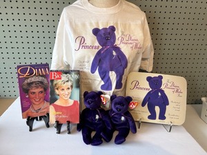 lot 93 image: Princess Diana Memorabilia Set Including T-Shirt, VHS Tapes, Beanie Babies, and Mousepad