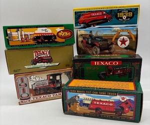 lot 124 image: Collection of 6 Texaco Vintage Die-Cast Truck Coin Banks