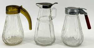 lot 153 image: Set of 3 Vintage Glass Syrup Dispensers with Metal Lids