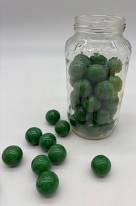 lot 235 image: Collection of Green Adventure Inc. Sphere Glass Marbles in Jar