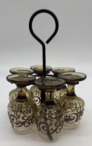 lot 277 image: Set of 6 Vintage Libbey Prado Brown Swirl Cordial Shot Glasses with Black Display Carrying Rack