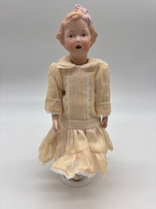 lot 286 image: Antique Bisque Gebruder Heubach Doll with Lace Trimmed Dress