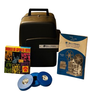 lot 62 image: Vintage Bell & Howell Model 346A Autoload Super 8mm Projector with Instruction Manual and Reels